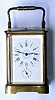 French, brass cased Carriage Clock, c.1900, GRAND SONNERIE, with slector in base for Pte Sonnerie, Silence and Gde Sonnerie, and with alarm and repeat. Fancy dial with black numerasl and blue decorations.