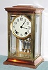 Ansonia Clock Co., 4-glass crystal regulator, the DAWSON model, with solid creamy porcelain dial, 8-day round, rack strike mov't.
