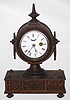 Ansonia Brass and Copper Co.,"TUCKER No. 2", bronze over iron shelf clock with one day balance wheel movement and porcelain dial.