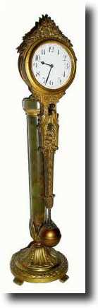 C.1900, German, Bronzed Spelter Swinging arm shelf clock — Antique Clocks Price Guide