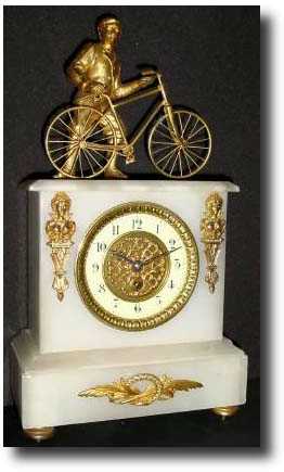 C.1900, French, Man and His Bicycle figural shelf clock — Antique Clocks Price Guide