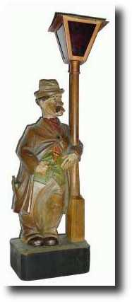 C.1935, German, Whistling Drunk at Lampost shelf clock — Antique Clocks Price Guide