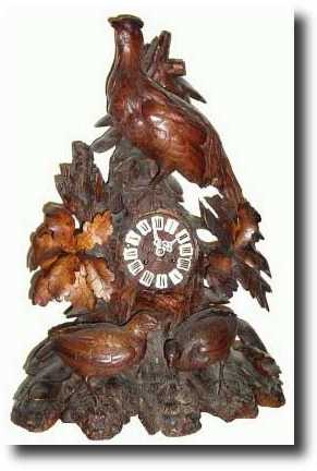 C.1880, Black Forest Carved Figural clock, — Antique Clocks Price Guide