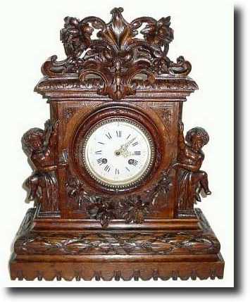 C.1880, Black Forest Carved mantel clock — Antique Clocks Price Guide