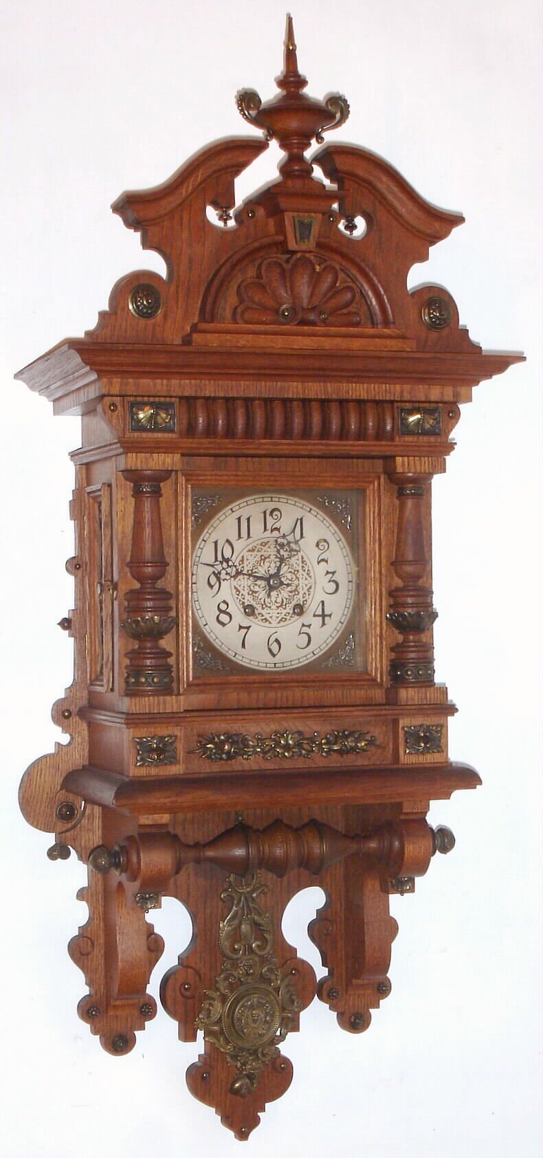 German, Lenzkirch, oak cased open well or "Berliner" style wall clock, 8-day time and strike, with profuse bronze trimmings, c1898, serial #1,164,173 — Antique Clocks Price Guide