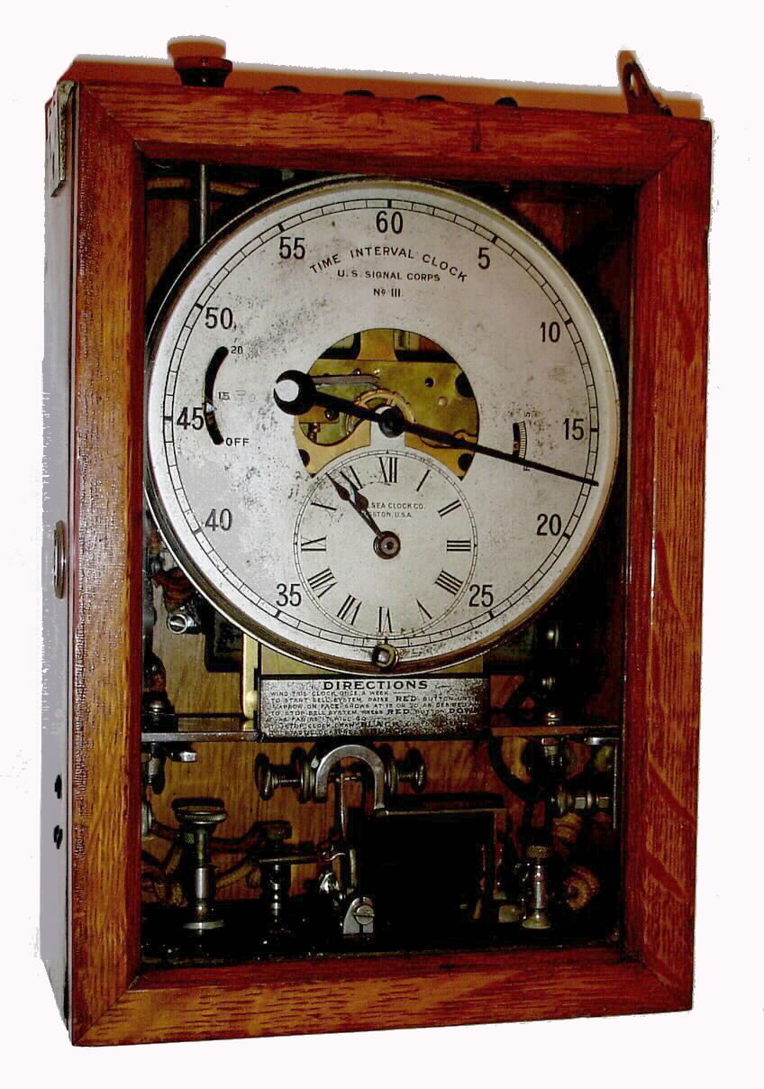 Chelsea Clock Co., Boston U.S.A. "Time Interval Clock No. III" U.S. Signal Corps military timepiece 8 day time only spring driven movement with electrical time interval component signaling on bell in oak case, c1940 — Antique Clocks Price Guide