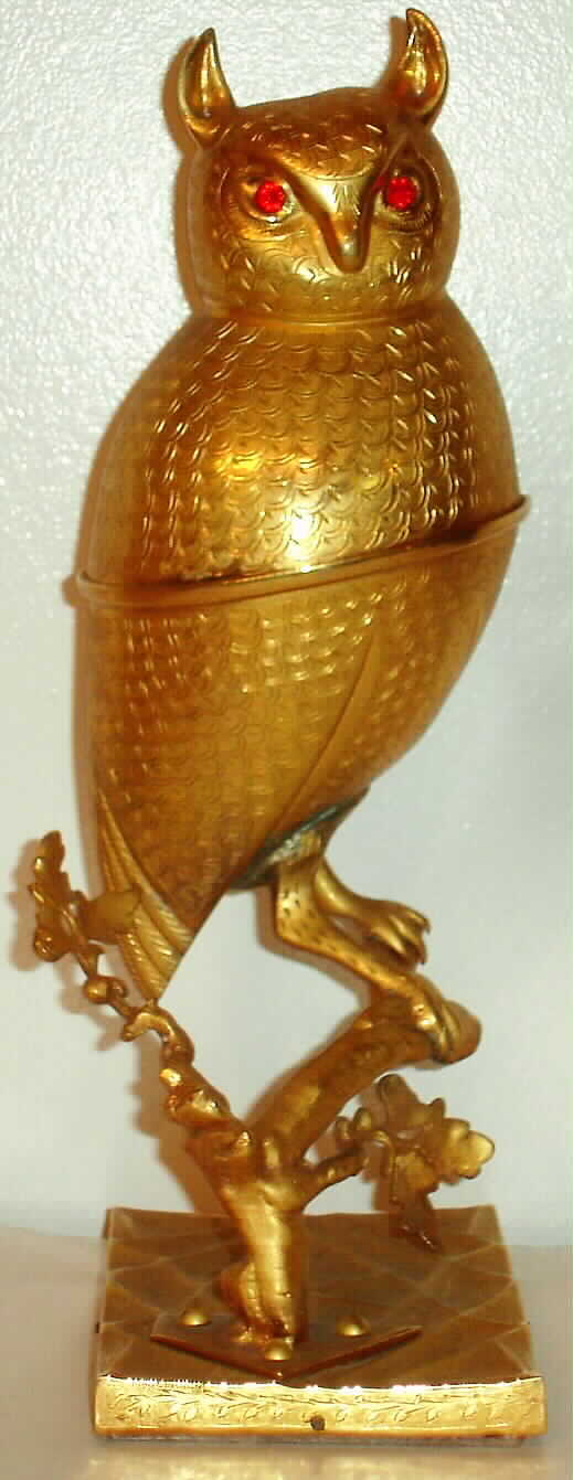 Music box Swiss, playing 2 tunes - Fledermaus and Skater's Waltz set within gilt owl figure with jewel set eyes, perched on limb, c1925 — Antique Clocks Price Guide