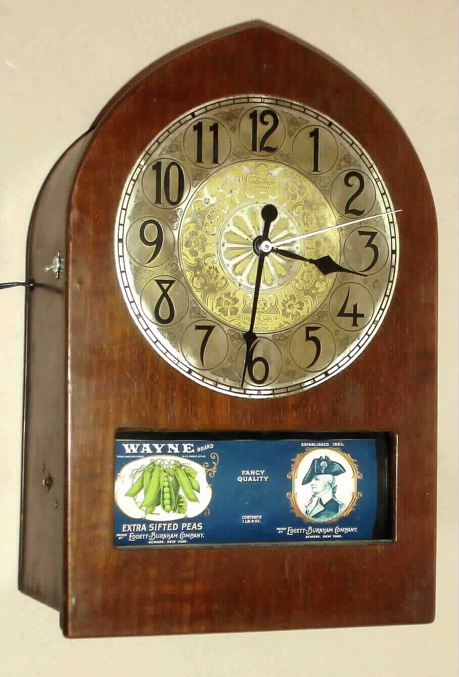 Electric Ad Clock Co., Chicago, IL, 110v, corded clock with side on-off switch, with segmented advertisements on a roller below the dial, C.1928. — Antique Clocks Price Guide