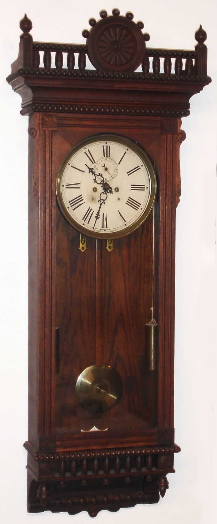 Waterbury Clock Co., Regulator No. 53, quartered oak wall clock, 8-day, 2-wt, time, key lock door, C. 1905 — Antique Clocks Price Guide
