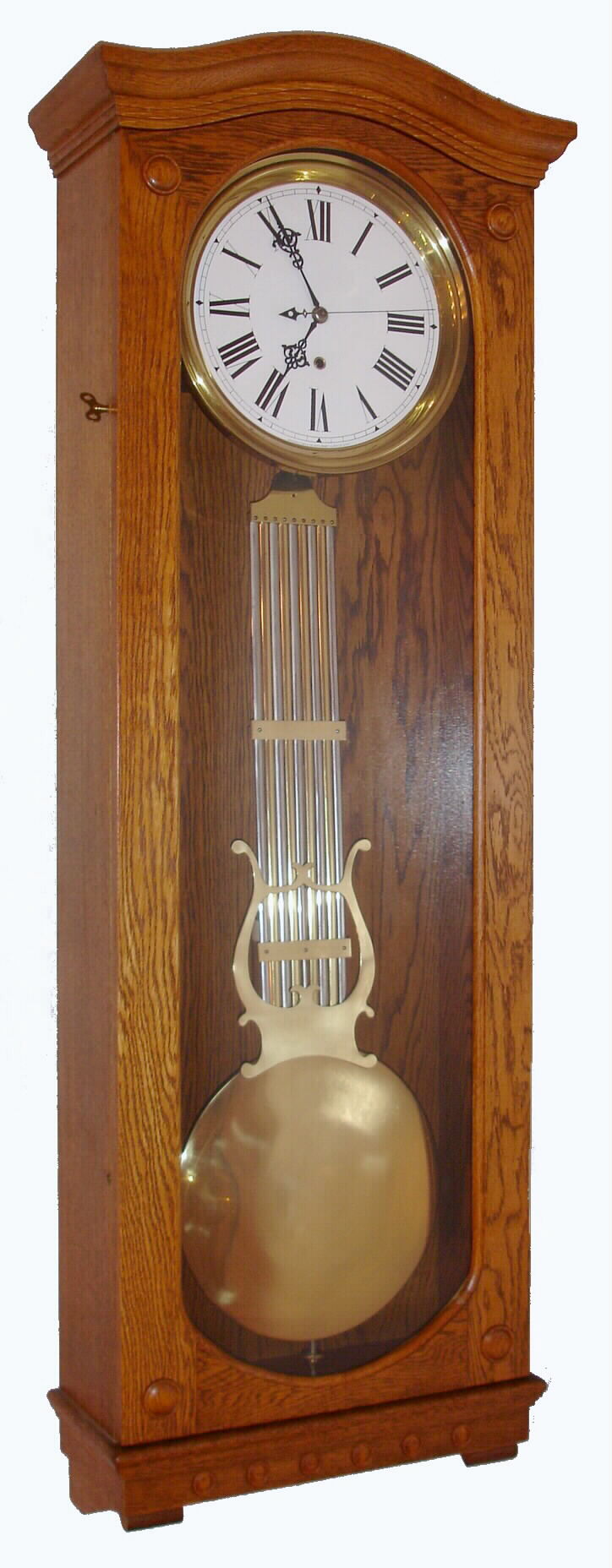 Waterbury Clock Co. regulator, time only movement with grid iron pendulum now in Standard Electric oak wall case with sweep second's hand, movement c1890, 8-day — Antique Clocks Price Guide