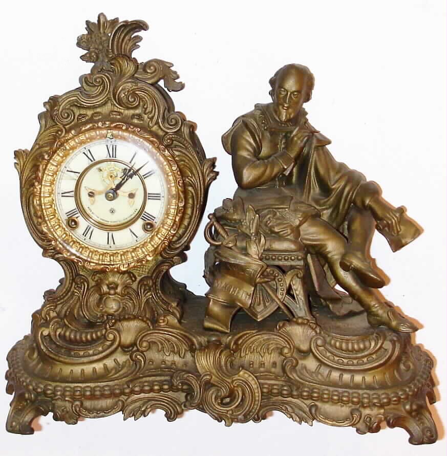 Ansonia Clock Co., New York, "MacBeth" cast metal figural time and strike 8-day mantel clock, C.1904. — Antique Clocks Price Guide
