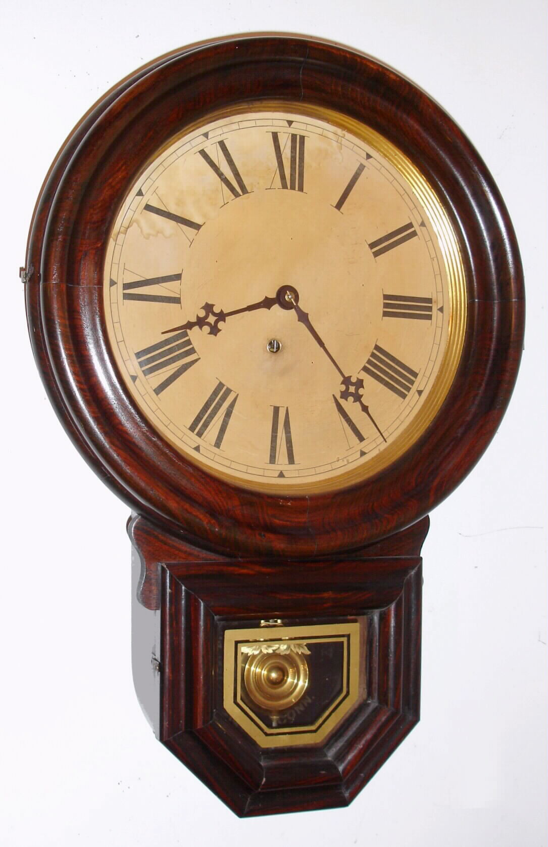 E. Ingraham Co., Bristol, Conn. "imitation rosewood" grain-painted 8-day time-only wall clock, C.1880. — Antique Clocks Price Guide