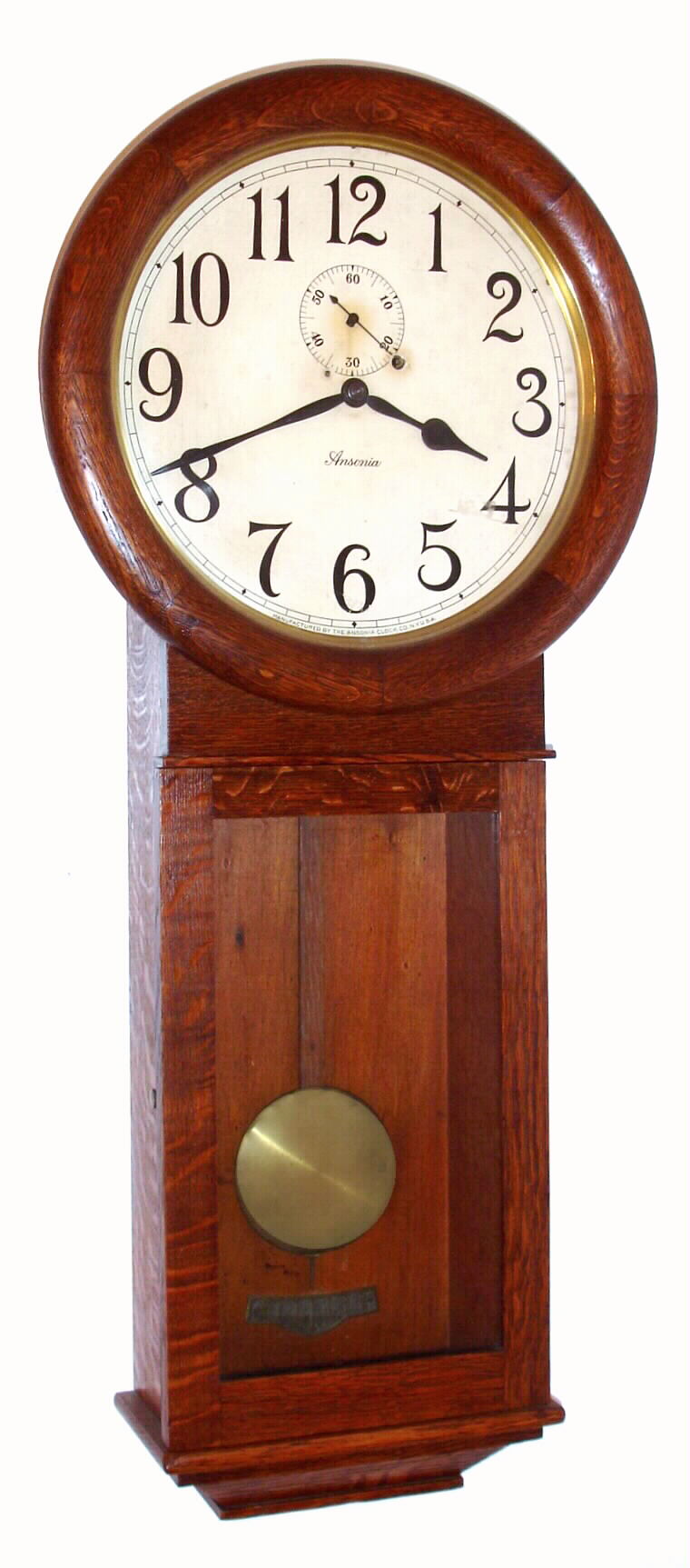 Ansonia Clock Co., New York, "Standard Regulator" oak 8-day weight-driven wall timepiece, C.1920. — Antique Clocks Price Guide