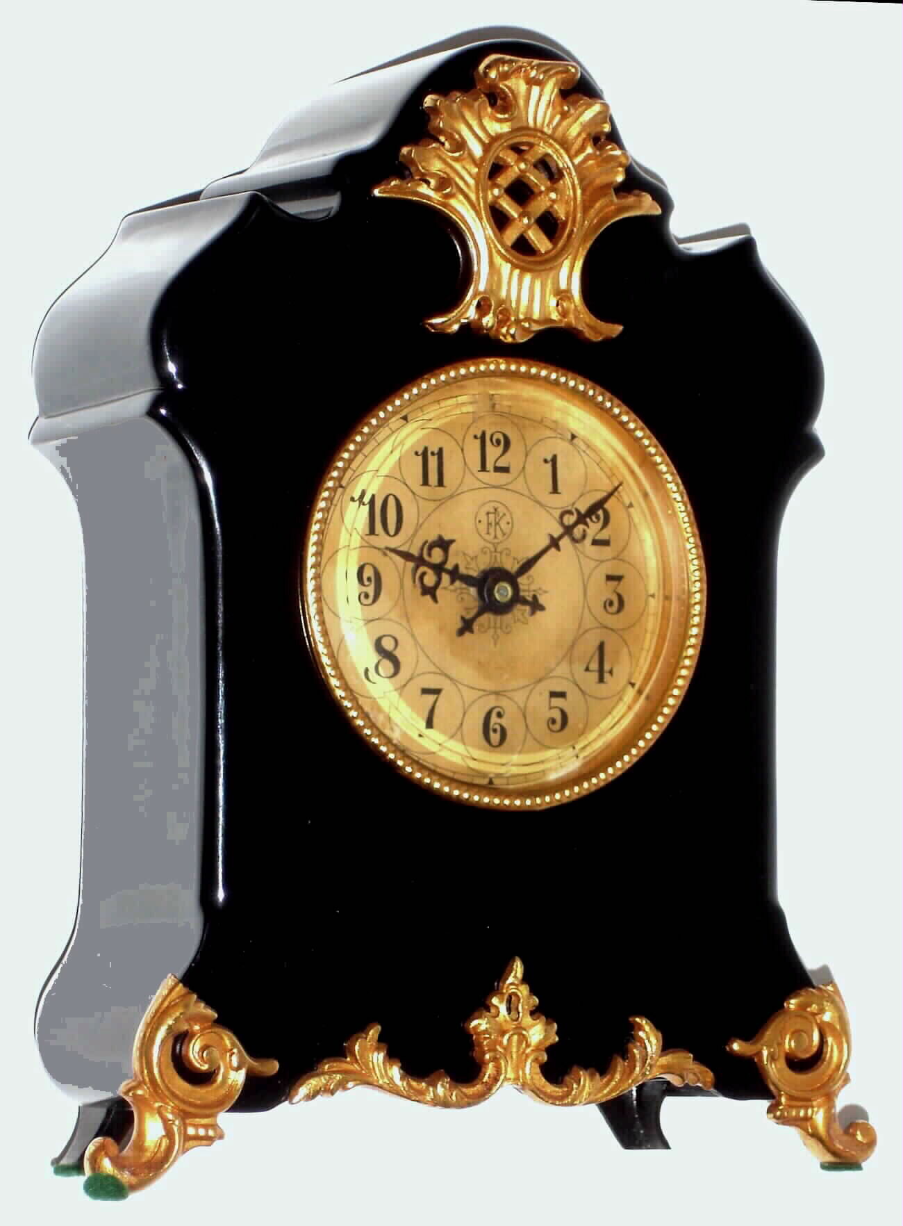F. Kroeber Clock Co., New York "Martha" alarm clock 30 hour time and alarm spring driven movement in black enamel iron case with beveled glass crystal, c1900 — Antique Clocks Price Guide