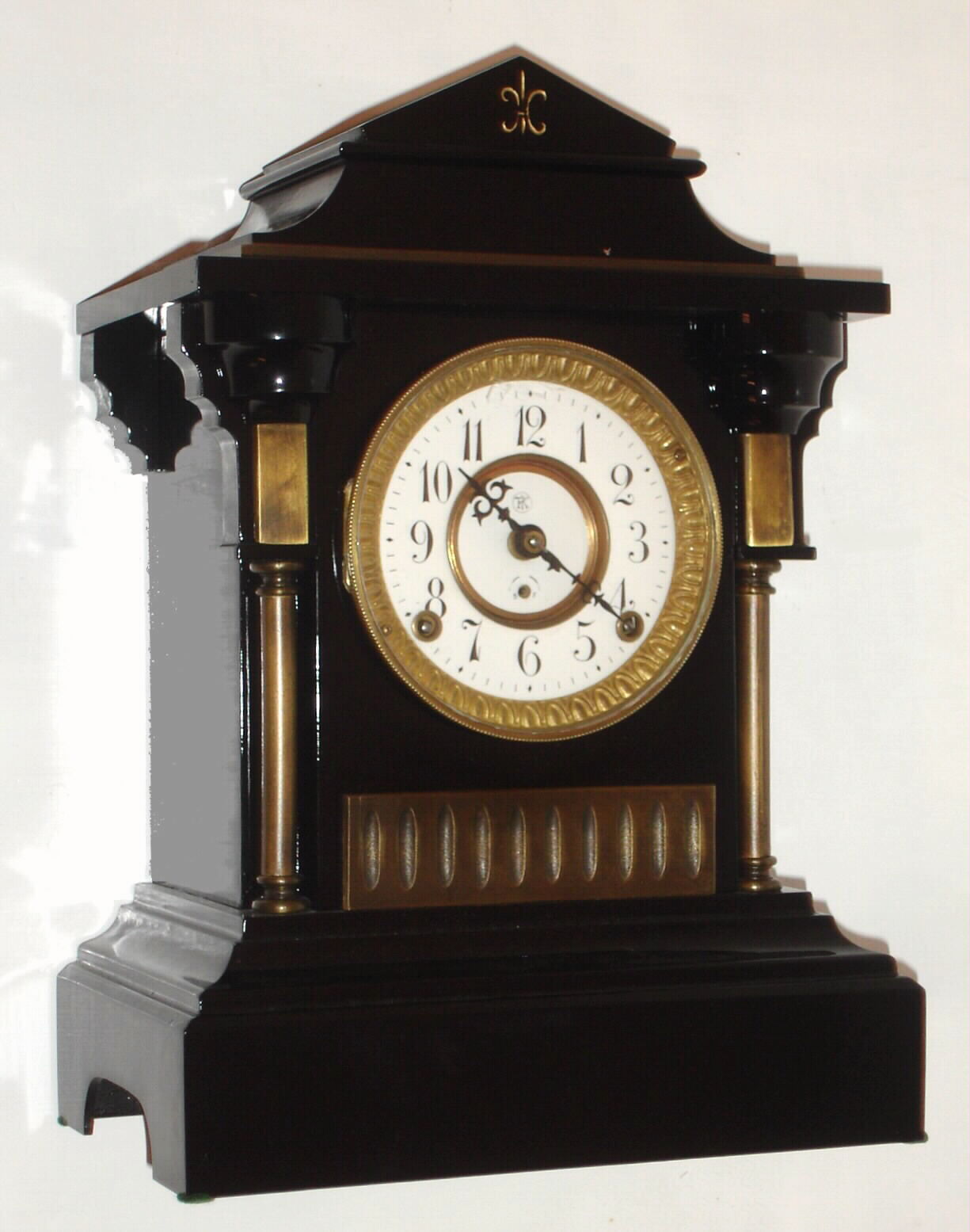 F. Kroeber Clock Co., New York "Vandalia" mantel clock 8 day time and strike spring driven Asian No. 1 movement in black enamel cast iron case with full turned columns and porcelain dial, c1890 — Antique Clocks Price Guide