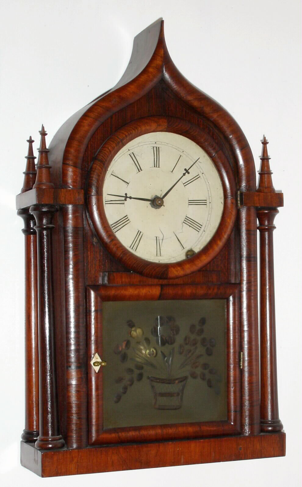 Brewster and Ingrahams, Bristol, Conn., Oriental Gothic or "onion top" mantel clock with 8 day time and strike spring driven movement with original brass springs in mahogany veneer case, c1840 — Antique Clocks Price Guide
