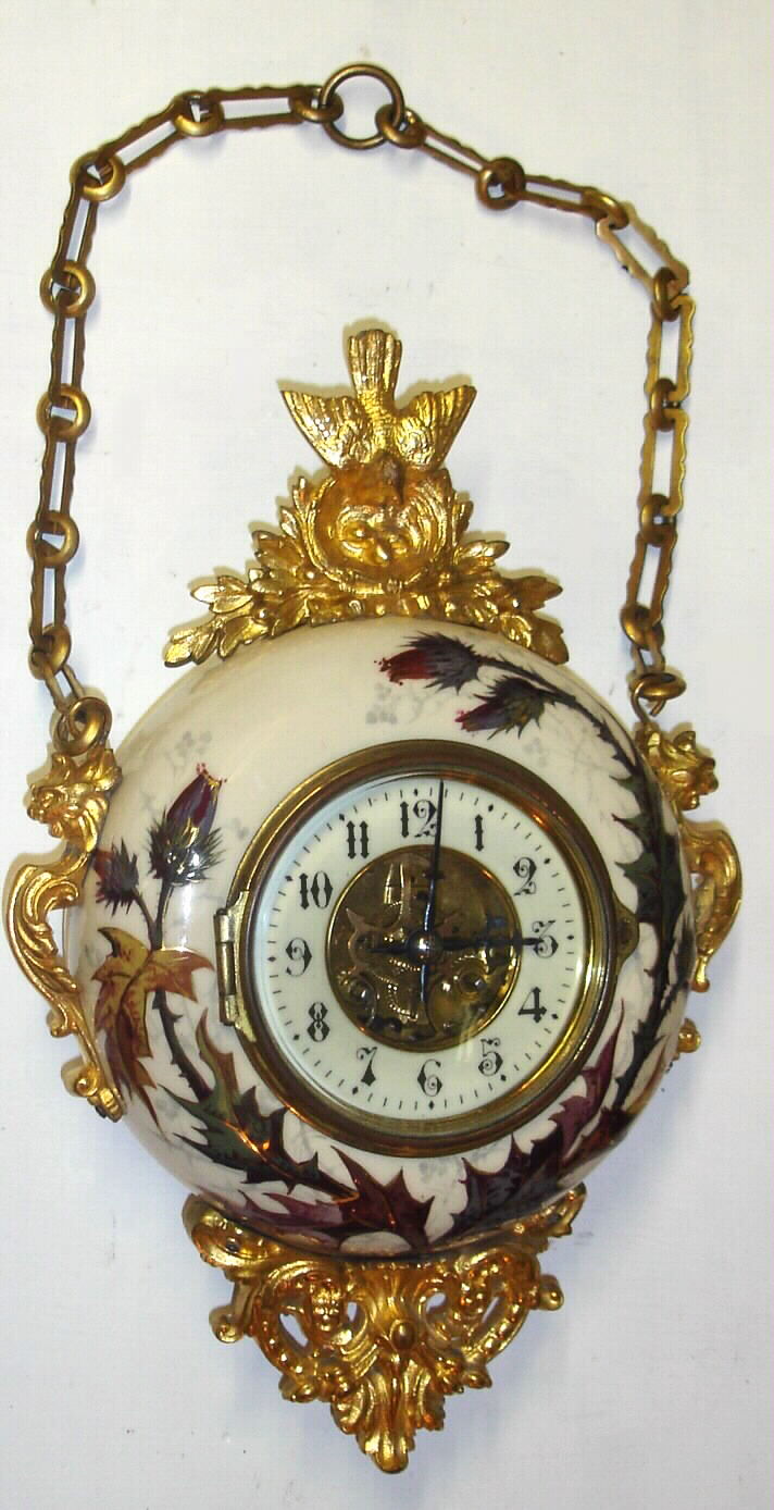 French "Fot Bte" hanging porcelain cartel clock, with cast decorations, 8-day time and strike clock, C.1900. — Antique Clocks Price Guide