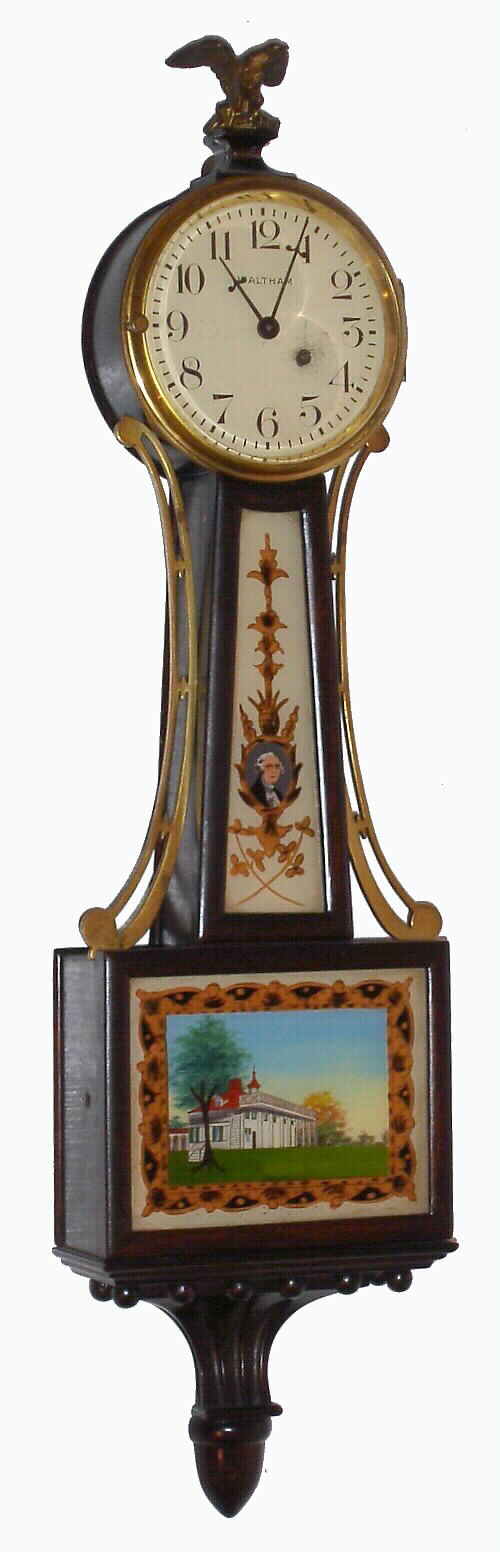 Waltham Clock Co., Waltham, Mass., "No. 1550" miniature banjo wall clock 8 day time only key wind spring driven movement in mahogany round front case with reverse painted throat and lower tablets, c1930 — Antique Clocks Price Guide