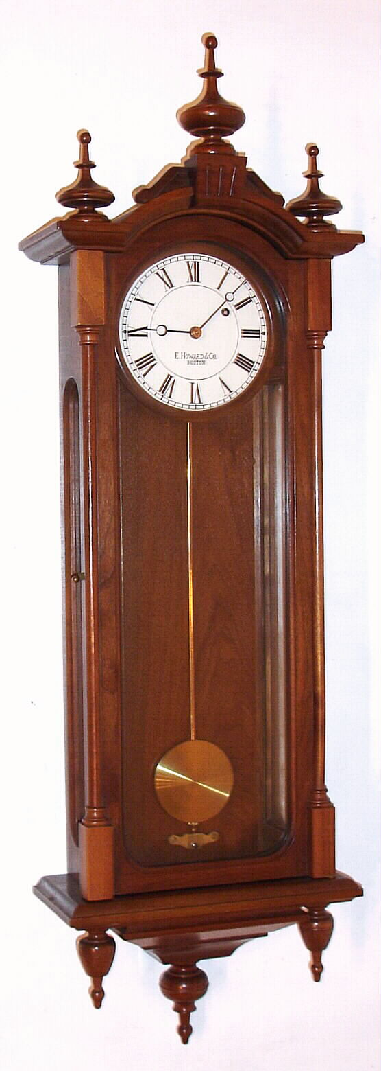 E. Howard and Co., Boston, "Regulator No. 59-6" (re-issue) 8-day time only weight driven movement stamped "E. HOWARD and CO. BOSTON 59 6" and stamped with serial number and date in walnut case, c1979 serial #3 (note this is the small, 6" dial model that went into production after the 59-8). — Antique Clocks Price Guide