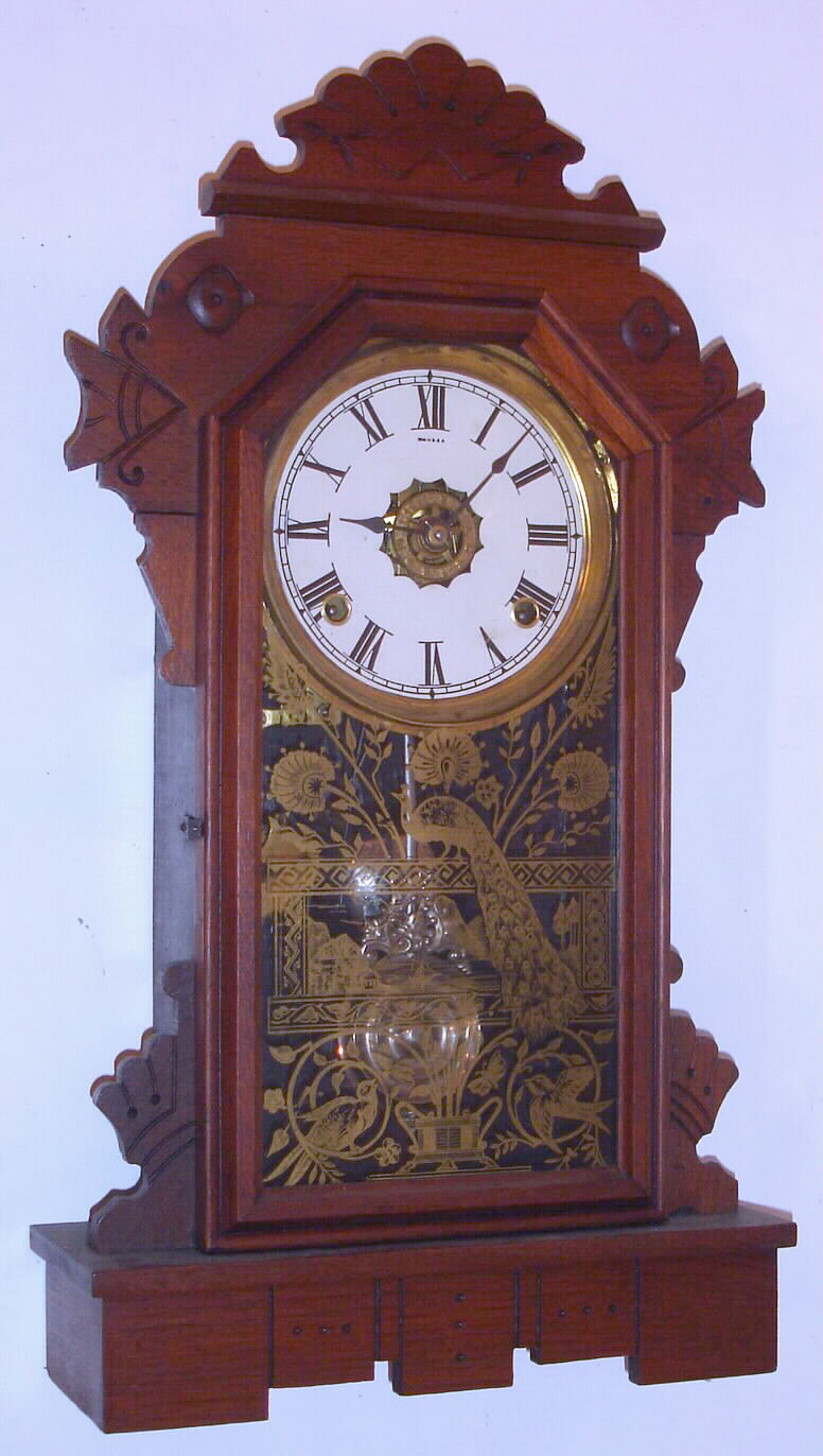 Ansonia Clock Co., Brooklyn, NY, "Alaska", 8-day time/strike/alarm walnut shelf clock, , C. 1880 — Antique Clocks Price Guide