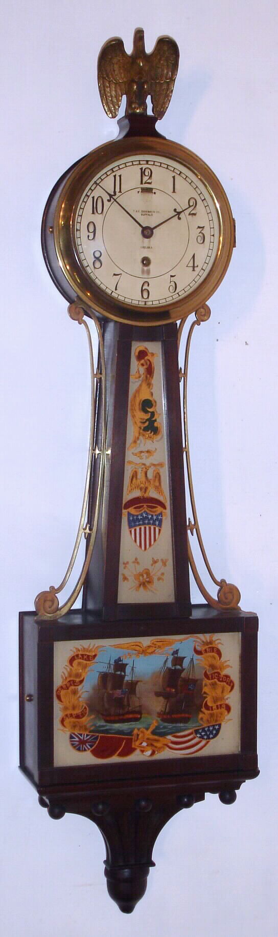 Chelsea Clock Co., Chelsea, Mass., C. 1925, 8-day 3/4 size banjo timepiece retailed by T. and E. Dickinson Co., Buffalo, NY Movement serial No. 167938. — Antique Clocks Price Guide