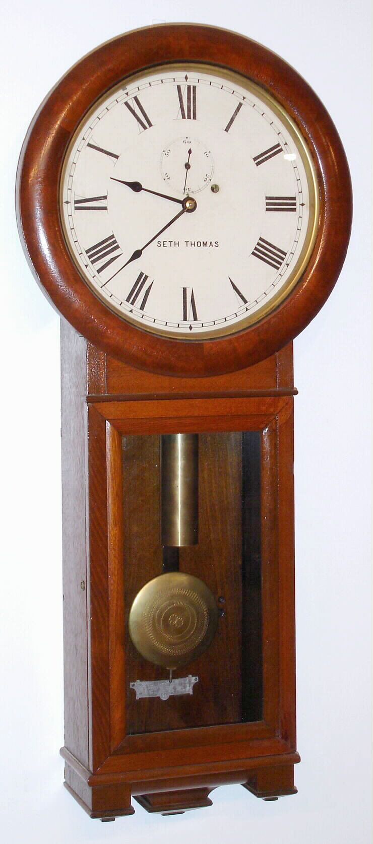 Seth Thomas Clock Co., "Regulator No. 2", 8-day weight timepiece in walnut, C. 1890 — Antique Clocks Price Guide