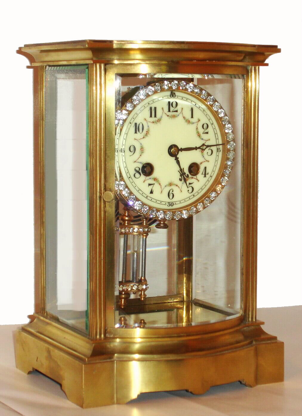 French, Marti and Cie, 8-day time/strike brass and glass crystal regulator, in a bow-front case and with fancy brilliant studded bezel and matching pendulum, C. 1900 — Antique Clocks Price Guide