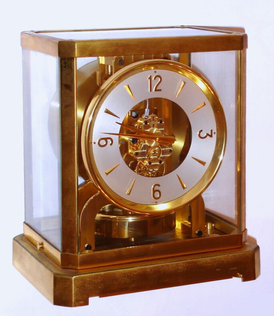 Swiss, LeCoultre, ATMOS, self winding perpetual running timepiece in a brass and glass lift-off case. Serial No. 20330, with carry case, C. 1947 — Antique Clocks Price Guide