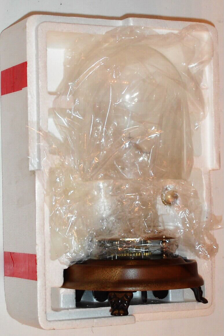 Horolovar Co., NY, C. 1975, repro of the Briggs rotary pendulum timepiece, 8-day, bottom wind with glass dome. — Antique Clocks Price Guide