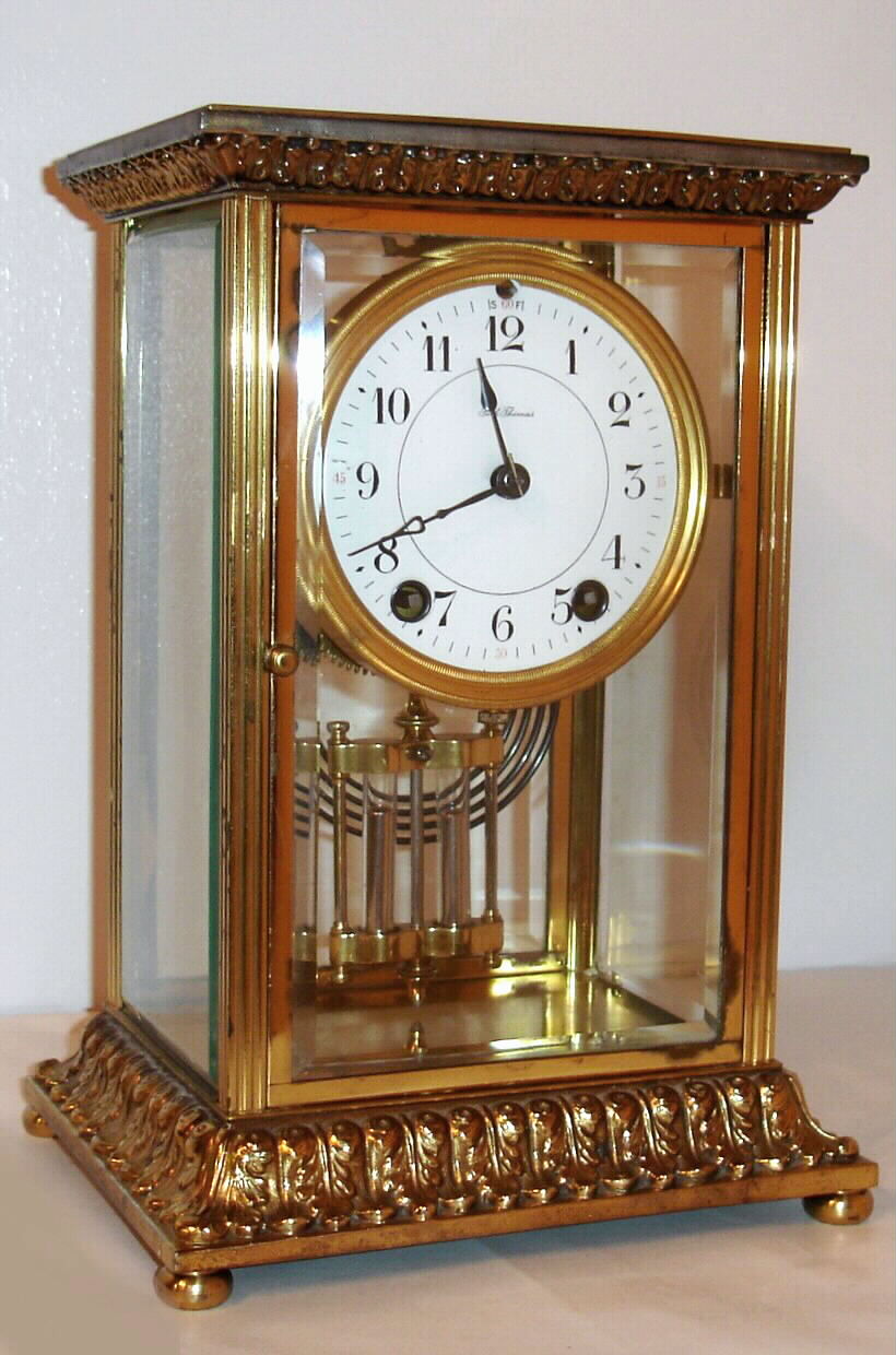 Seth Thomas Clock Co., 8-day time/strike brass and glass crystal regulator mantel clock. We could not find this model with heavy cast top and bottom, in the catalogs, C.1906 — Antique Clocks Price Guide