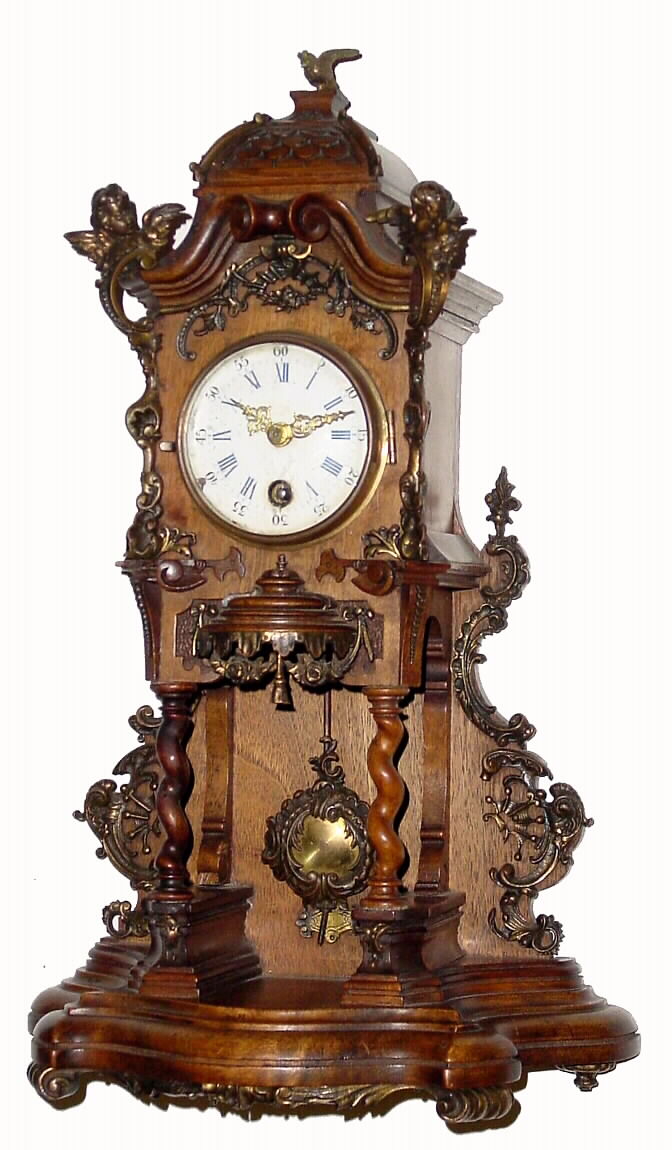 German, Lenzkirch, open well mantel clock 8 day time only movement in intricately carved case with Rococo style bronze pendulum and bronze mounts, c1866 — Antique Clocks Price Guide