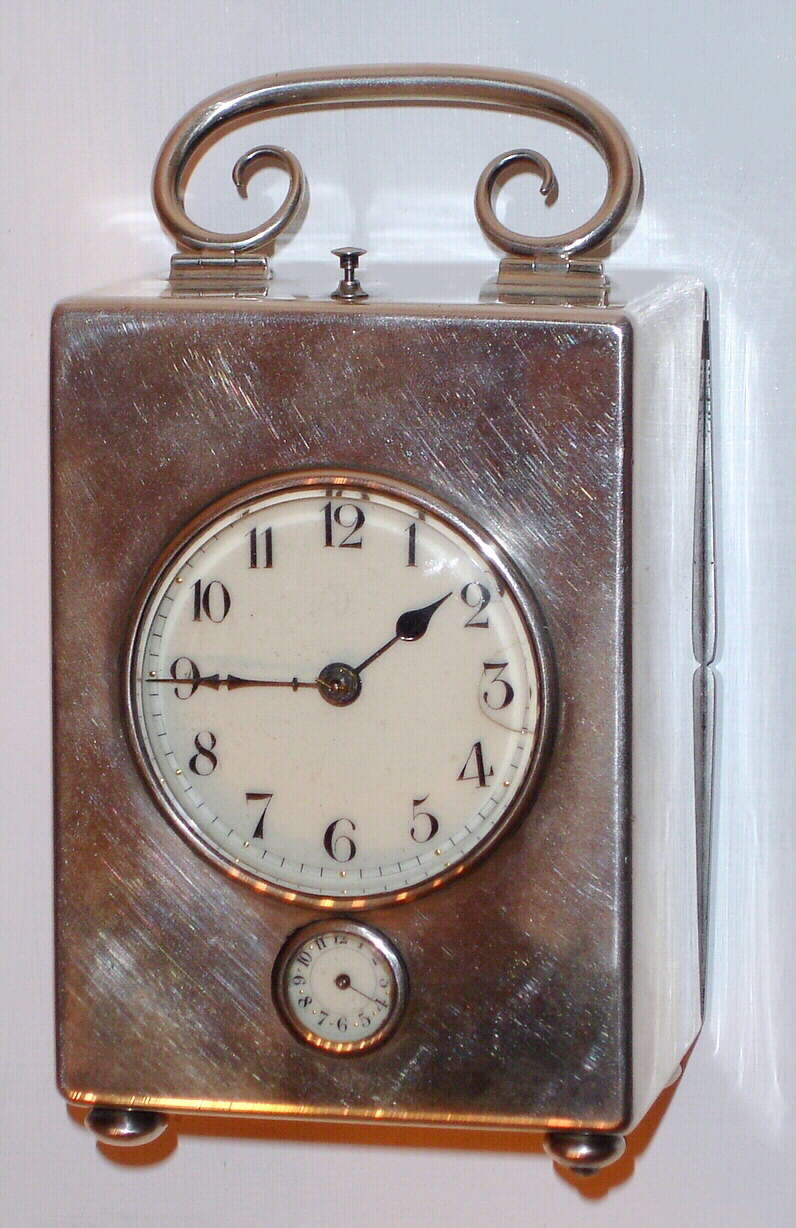 French, Grand Sonnerie with alarm/repeat carriage clock in an English silver case. A lever on the bottom of the case allows one to change from Grand Sonnerie to Silence to Petit Sonnerie, C.1900 — Antique Clocks Price Guide