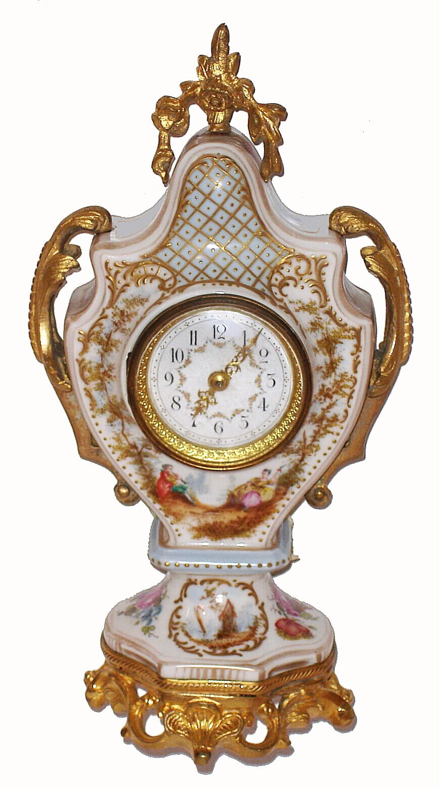 French, lady's boudoir timepiece, in a porcelain case, with a very small cylinder 'scape movement with fancy dial and hands, C. 1900 — Antique Clocks Price Guide
