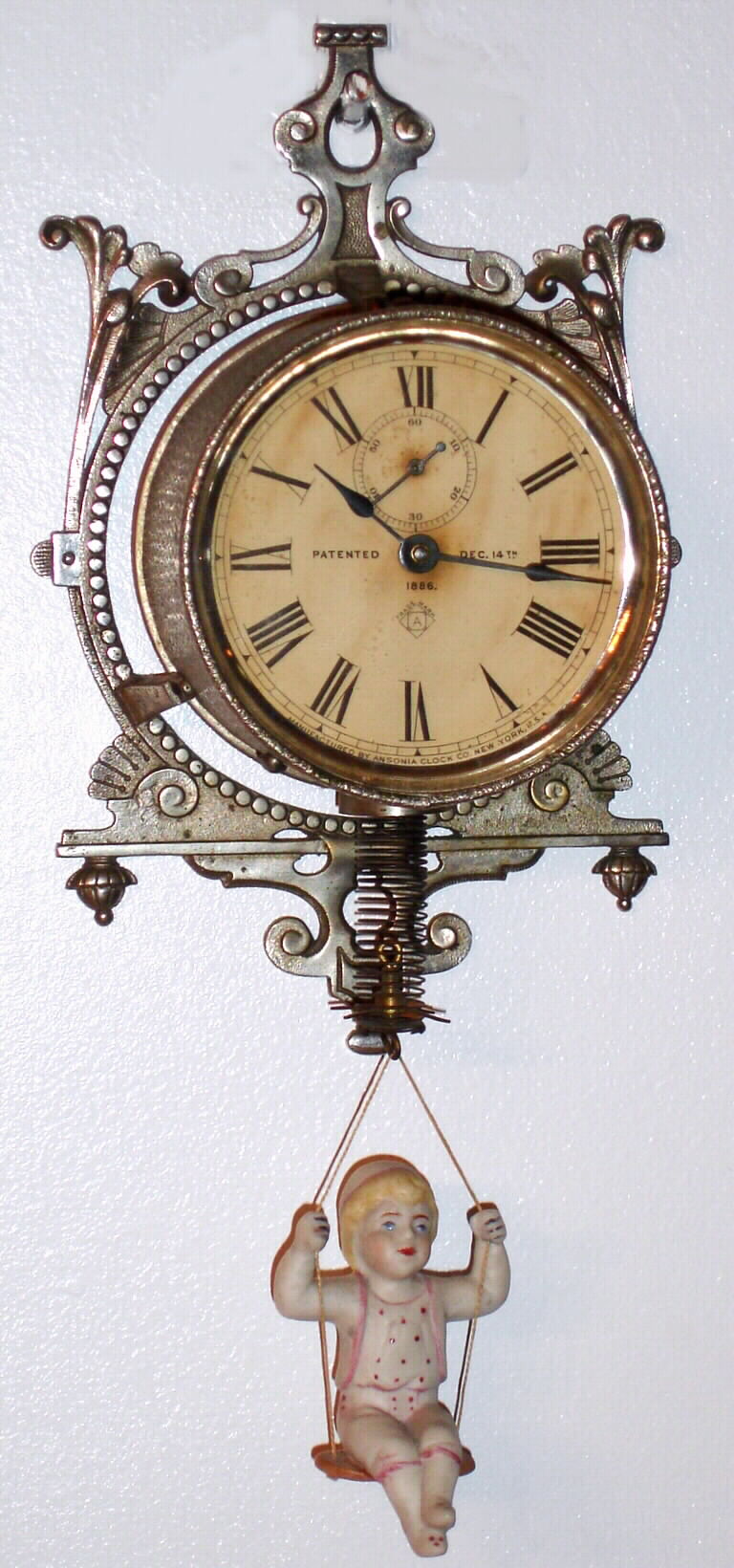 Ansonia Clock Co., "Jumper No. 3", 30-hour bobbing doll timepiece, C.1891, — Antique Clocks Price Guide