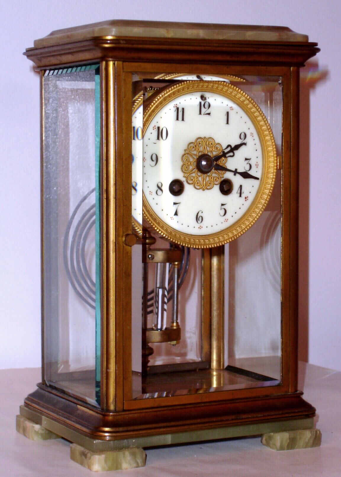 French, Mougin for H and H, 8-day time/strike brass and glass with green onyx top and feet crystal regulator, C.1910 — Antique Clocks Price Guide
