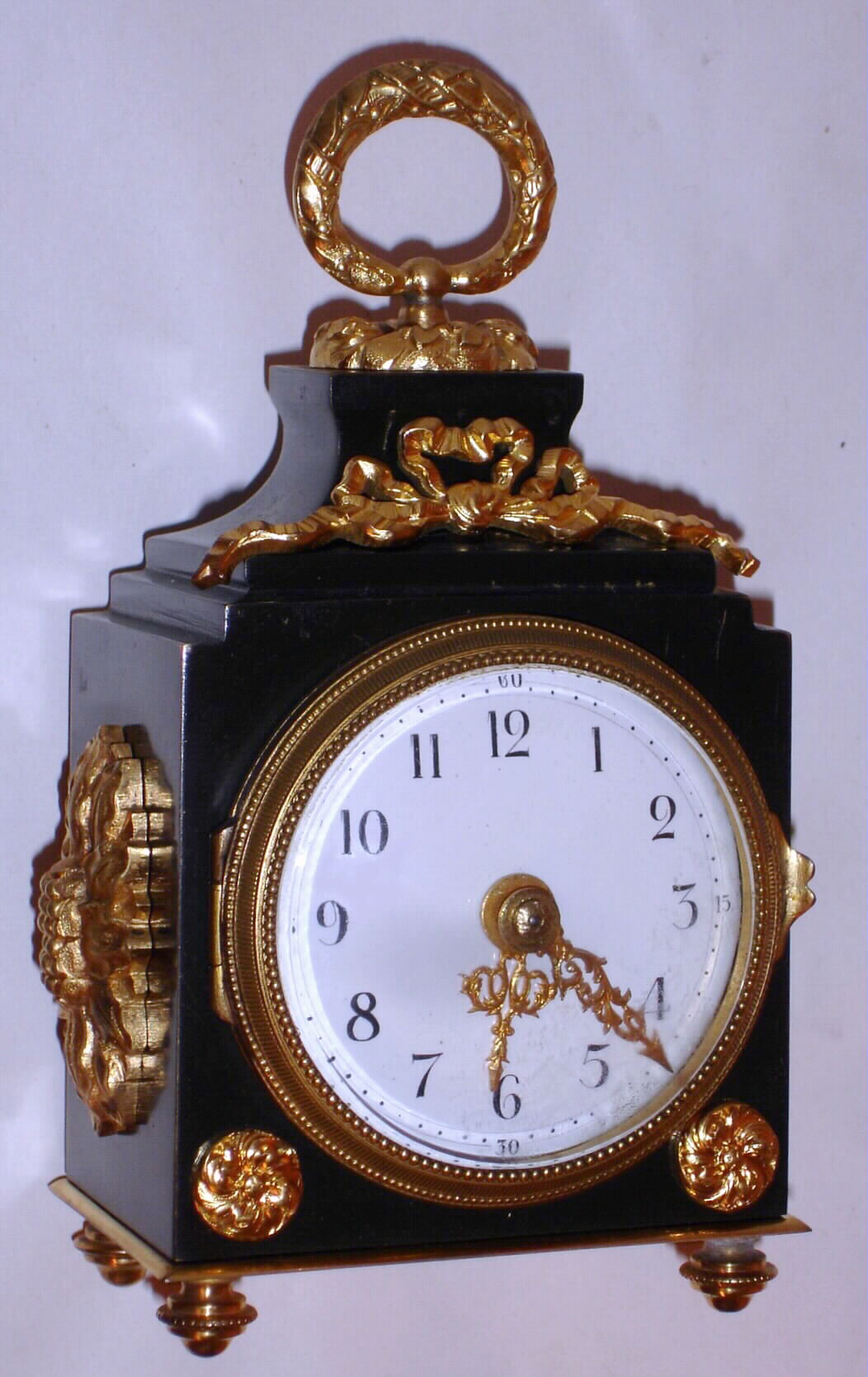 French, "Pendule d'officier", 8-day dore bronze travel timepiece. These timepieces are copies of the type made in the 18th and early 19th century fitted with a platform escapement like those used in a carriage clock, c1900 — Antique Clocks Price Guide