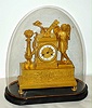 French Empire, ormolu figural mantel clock 8 day time and strike mvt with silk thread suspension on a wooden base with period glass dome, c1830