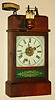 Ansonia Clock Co., "Illuminated Alarm", 30 hour time and alarm cottage clock, with patent mechanism added by H. J. Davies of NY, C.1875.