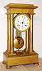 French, Chaveau, Paris, 4-Column Empire mantel clock, bright ormolu case, the well made pinwheel movement with 60 pins in 'scape wheel and affording half seconds on the dial, also with central calendar and knife edge suspension, C.1830.
