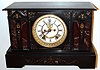 Ansonia Clock Co, New York, "El Pinafore" black marble 8-day time and strike mantel clock, C.1904.