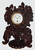 Swiss, Black Forest style carved mantel clock from Interlaken area, with French 8-day time-only movement, C.1890.