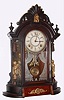 Wm.L. Gilbert Clock Co., Winsted, Conn. "Occidental" walnut 8-day time and strike parlor clock, C.1891.