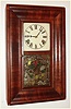 E.N. Welch, Forestville Conn., mini OG mahogany-veneer 8-day time and strike mantel clock, C.1869.