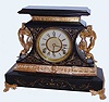 Ansonia Clock Co., New York, "Rosalind" black enameled iron 8-day time and strike mantel clock, C.1904.
