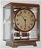French, J.L. Reutter ATMOS clock, atmospheric driven time only movement with torsion pendulum designed using mercury inside a glass tube similar to that of a thermometer to react to sensitive changes in temperature and atmospheric conditions, nickel plated case and Arabic numeral painted dial, serial No. 5398 c1930