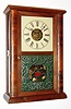 Chauncey Goodrich, Forestville, Bristol, Conn., 8-day time, strike and alarm Empire glass-side mahogany mantel clock, C.1854.