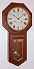 Seth Thomas, Thomaston, Conn., "World" mahogany 15-day time-only long-drop school clock, dated 1905.