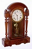 F. Kroeber Clock Co., New York, "Niagara" 8 day time and strike on bell spring driven movement in walnut case, c1880