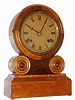 E. Ingraham and Co., Bristol Conn. "Grecian" mantel clock 8 day time and strike spring driven movement in a burled wood case, c1880