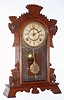 F. Kroeber Clock Co., New York unlisted parlor clock 8 day time and strike spring driven movement in walnut case, c1890